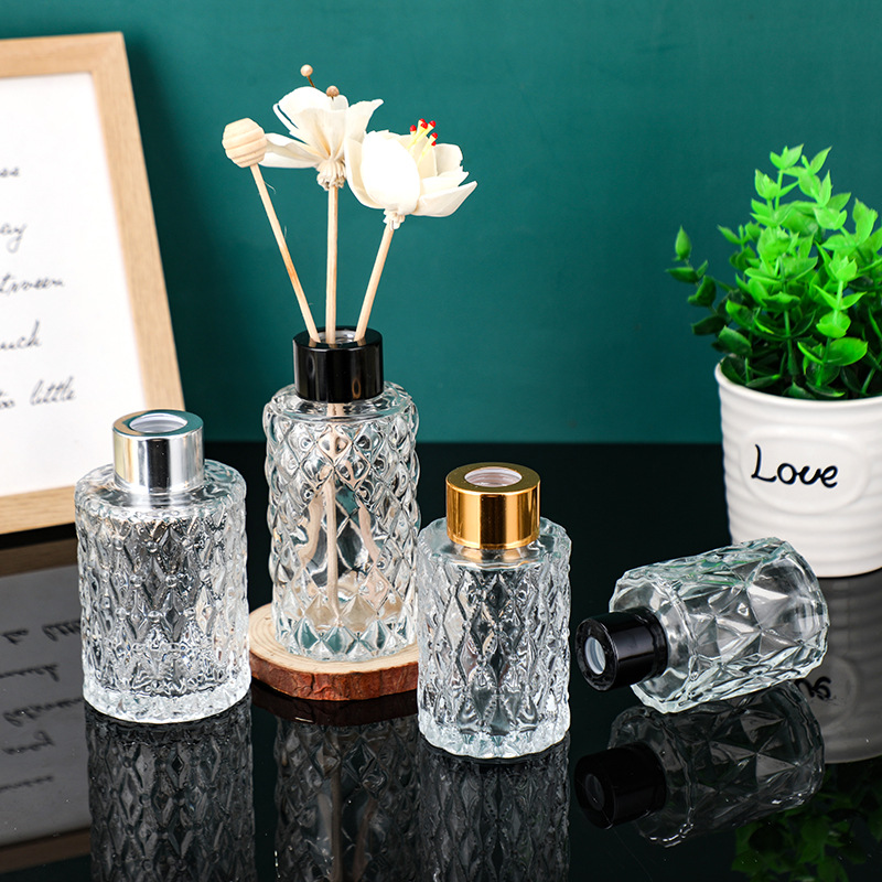 Embossed diffuser bottles